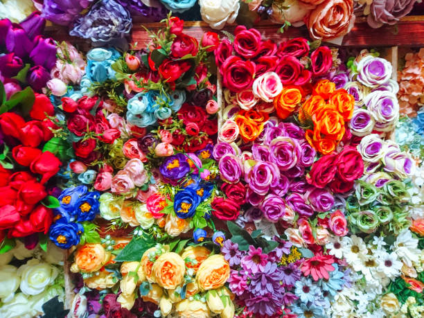 istock abstract background of many colorful artificial flowers 904256928