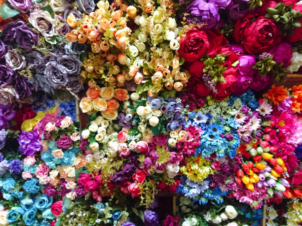 istock abstract background of many colorful artificial flowers 904257342