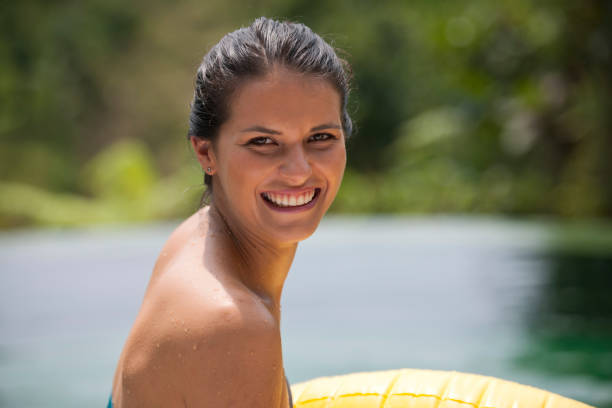 istock Smiling woman on vacation 904257846
