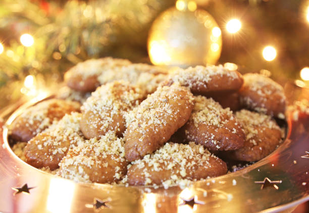 greek melomakarona traditional Christmas cookies with honey and nuts stock photo