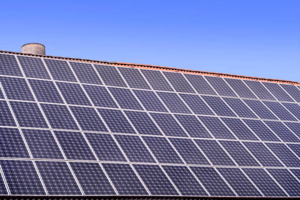 istock solar panels on a house roof 904272250