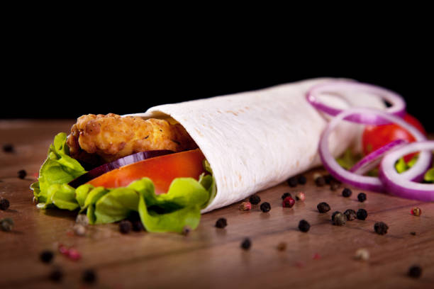 istock Dish fast food on a black background for the menu. 904273144