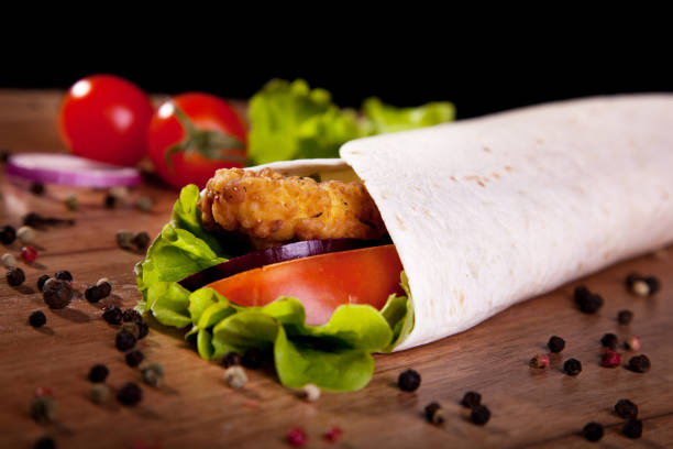 istock Dish fast food on a black background for the menu. 904273146