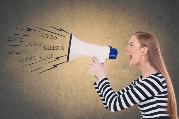 istock Businesswoman speaking on megaphone 904278142