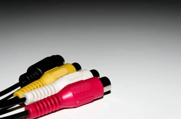 Multicolored AV cable connectors isolated on white background.