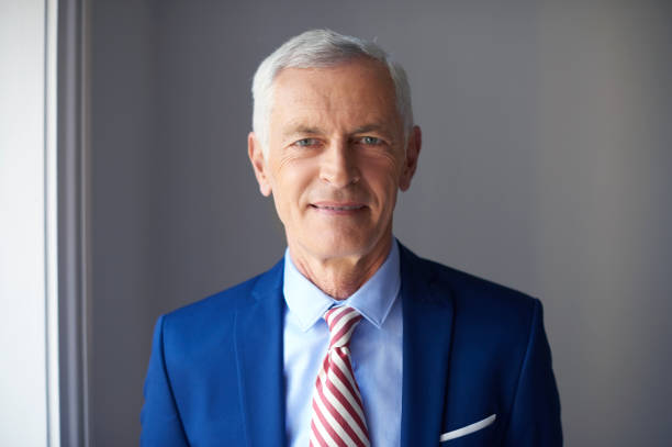istock A confident smiling elderly businessman portrait 904285644