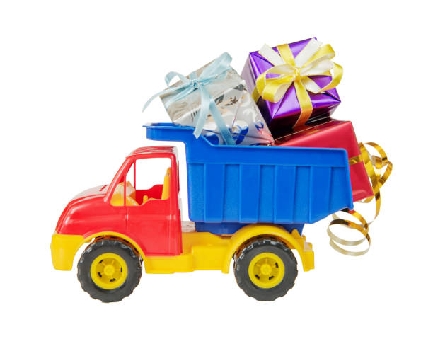 istock Toy truck carries gift boxes 904285932
