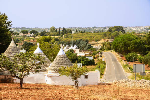 Trulli in the countryside of the Itria valley Trulli in the countryside of the Itria valley alberobello photos stock pictures, royalty-free photos & images