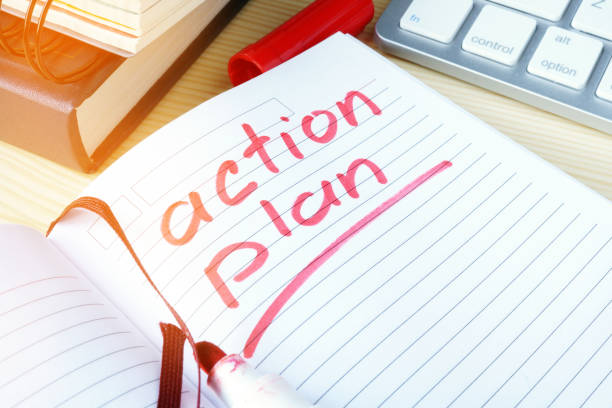 action plan written in a note. - plan of action imagens e fotografias de stock