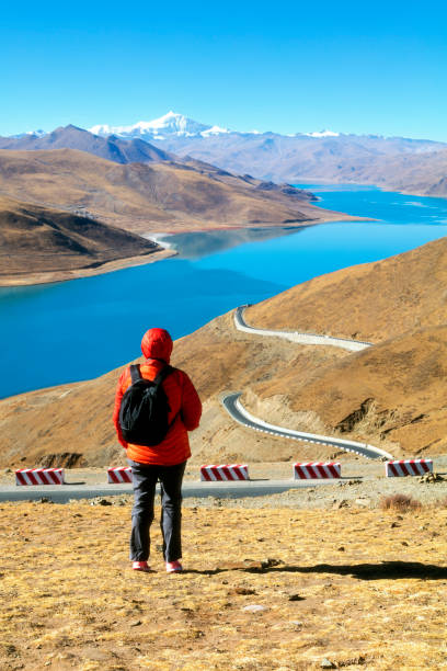 istock Female backpacker standing on mountain in Tibet 904293662
