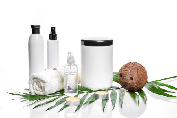 Organic cosmetics with coconut on white background