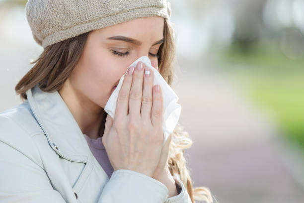istock Woman with flu outdoor 904299982