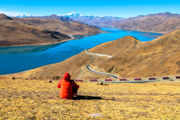 istock Female hiker sitting on mountain 904300510