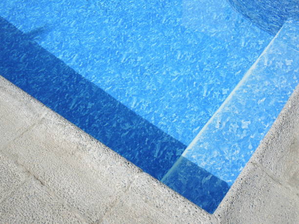 istock Swimming pool with turquoise water 904307572