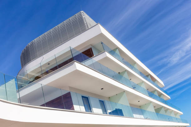 istock Rows of balconies in modern white apartment building 904315978