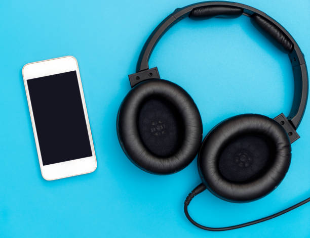 istock Empty mobile screen with headphone for music listen concept 904316470