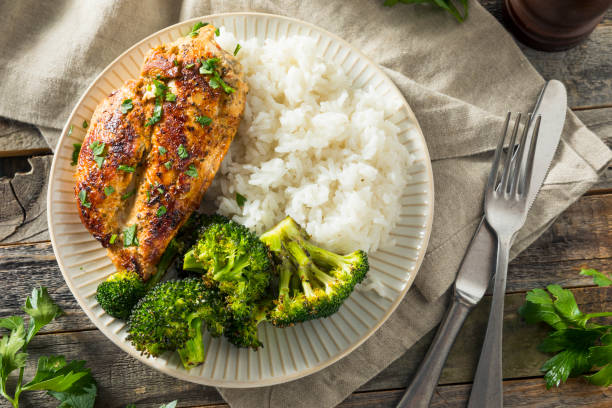 Healthy Homemade Chicken Breast and Rice Healthy Homemade Chicken Breast and Rice with Broccoli grilled chicken breast stock pictures, royalty-free photos & images