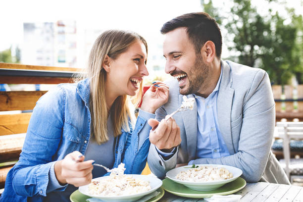Couple enjoying restaurant stock photo
