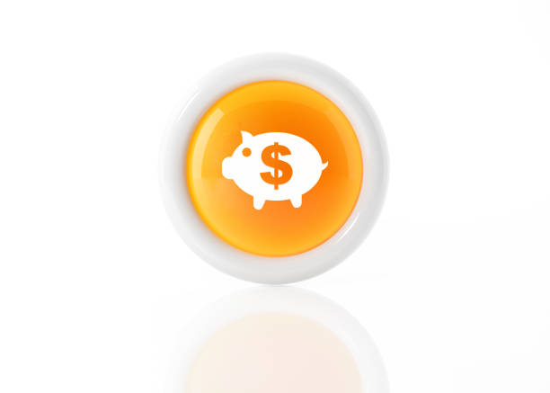 Closeup of a boy placing a coin in a generic piggy bank.