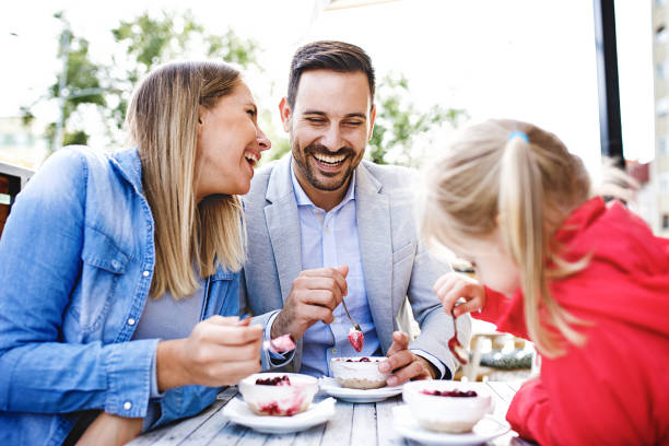 Family enjoying restaurant stock photo