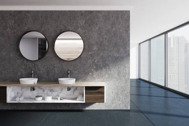 istock Concrete wall bathroom, sink and mirrors 904337058