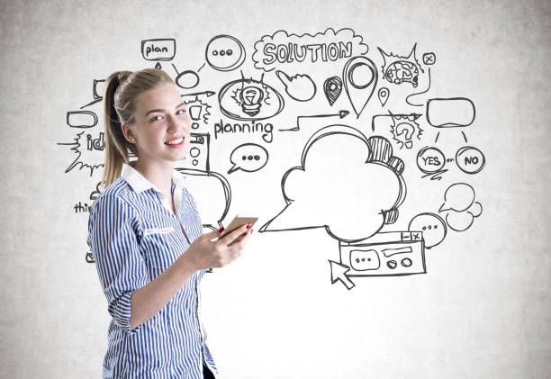 istock Cheerful businesswoman, smartphone, speech bubbles 904341062