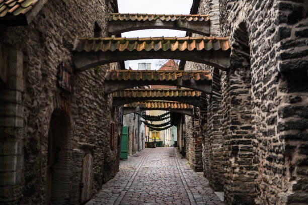 Low-angle view of St. Catherine’s Passage in Tallinn, Estonia, a medieval passage containing some of the old remainings of a Dominican Monastery in the city.
