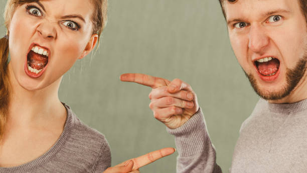 istock Husband and wife yelling and arguing. 904347478