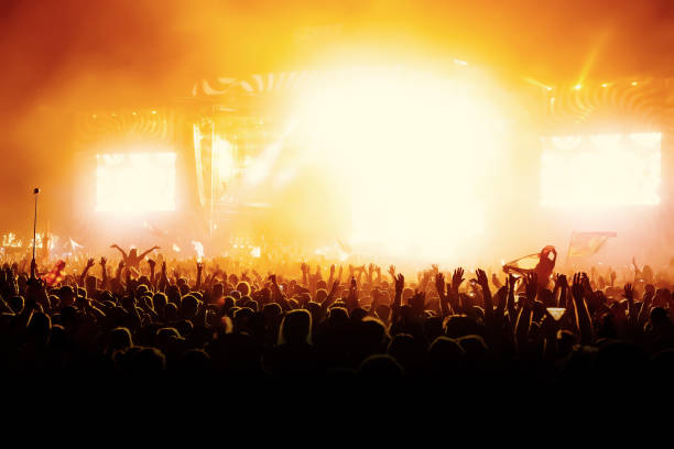 istock silhouettes of concert crowd 904351884