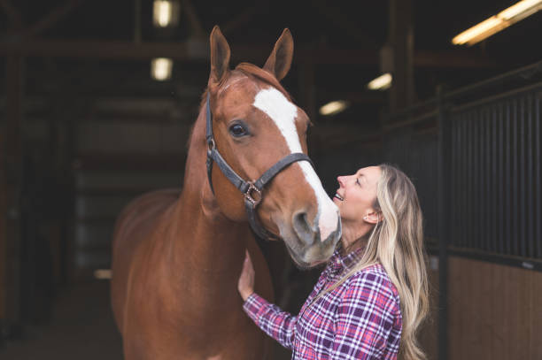 istock A Woman and Her Horse 904352016