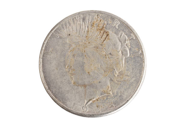 istock old vintage silver dollar isolated on background 904355390