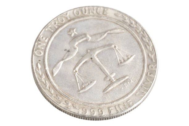 istock old vintage silver dollar isolated on background 904355588