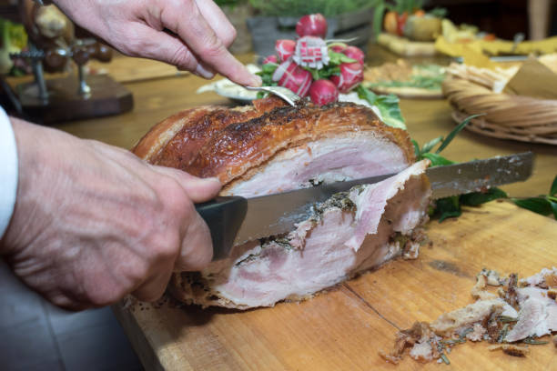 istock Cutting the porchetta 904355800