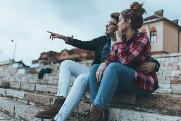istock Young couple sharing love outdoors on a beautiful day 904358922