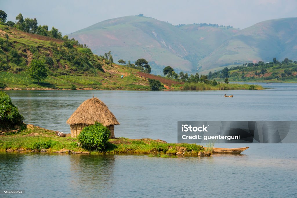 Shoreline of Lake Kivu, Congo, Africa The green shoreline of Lake Kivu between the countries DR Congo and Rwanda in the heart of Africa. Lake Kivu is in the Albertine Rift, the western branch of the East African Rift. Lake Kivu empties into the Ruzizi River, which flows southwards into Lake Tanganyika. Lake Kivu Stock Photo