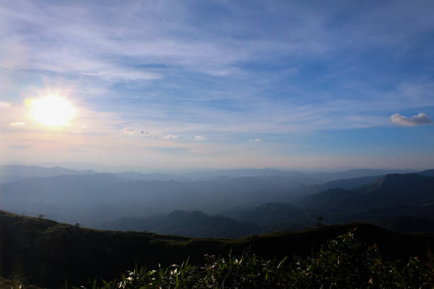 istock Beautiful mountain landscape, with mountain peaks covered with forest and a cloudy sky 904386964