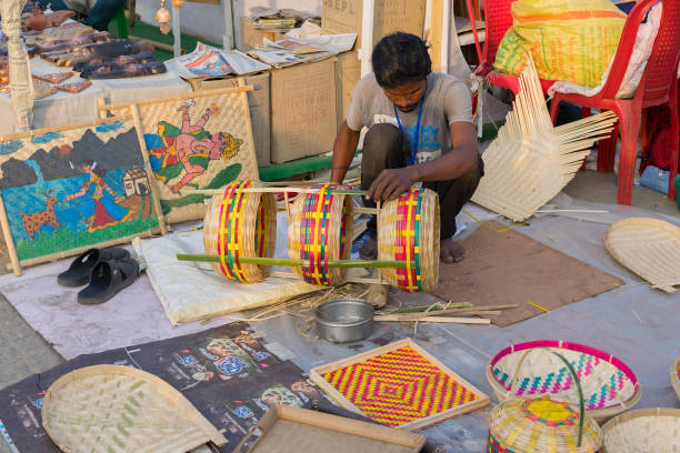 Kolkata, West Bengal: Unidentified persons making Cane furnitures , handicrafts on display during the Handicraft Fair in Kolkata.