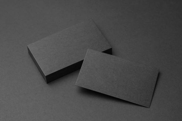Business card on black background stock photo
