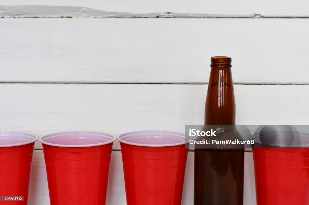Red Solo Cups And Beer Bottles Stock Photo - Download Image Now - Cup,  Individual Event, Red - iStock