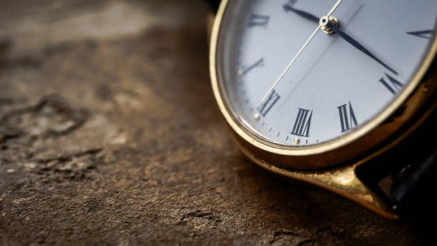 istock Close up front view of a modern wrist watch on the table. Soft focus. Free space for text 904414188