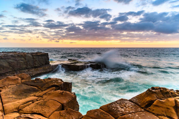 istock Rocky Sunrise Seascape 904414200