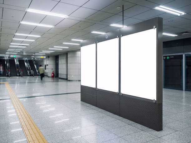 istock Mock up Blank Banners Media in Subway station with blurred people 904426652