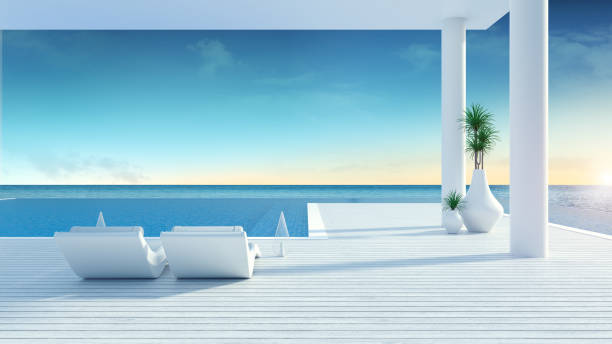istock Beach lounge ,sun loungers on Sunbathing deck and private swimming pool with  panoramic sea view at luxury villa,summer /3d rendering 904427006