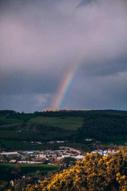 istock English Countryside with rainbow 904428330
