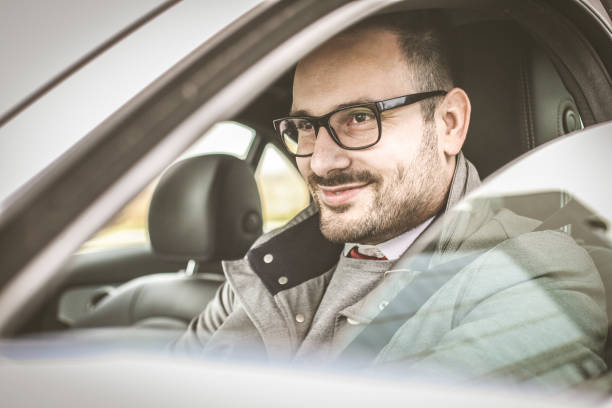 istock Business man in car. 904434086