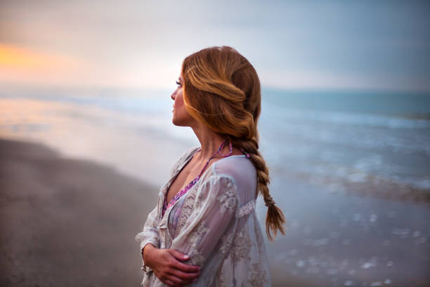 istock Dreamy girl on beach 904437790
