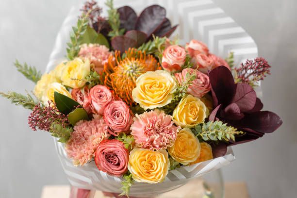 istock Flower composition on a gray background. Wedding and Festive decor. Bouquet from spring flowers. closeup 904438818