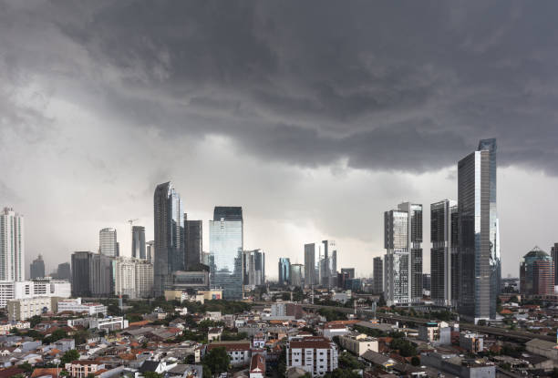 istock Threatening sky just before a tropical downpour on Jakarta business district 904441726