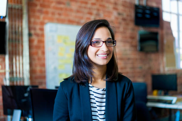 istock Smiling businesswoman wearing eyeglasses 904452852