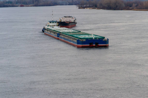 istock Cargo ship and barge sailing on the river Dnieper 904452980